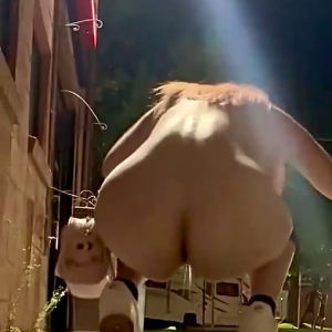 Cute_younger_lady_unloads_on_the_sidewalk_at_night_-_ThisVid.com.mp4